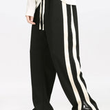 Color Block Patchwork Polo Sweatshirt & Slit Hem Stripe Pants Set