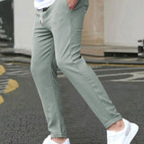 STRETCH TAPERED TROUSERS FOR MEN