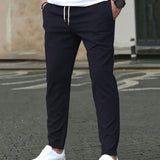 STRETCH TAPERED TROUSERS FOR MEN