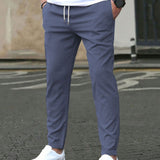 STRETCH TAPERED TROUSERS FOR MEN